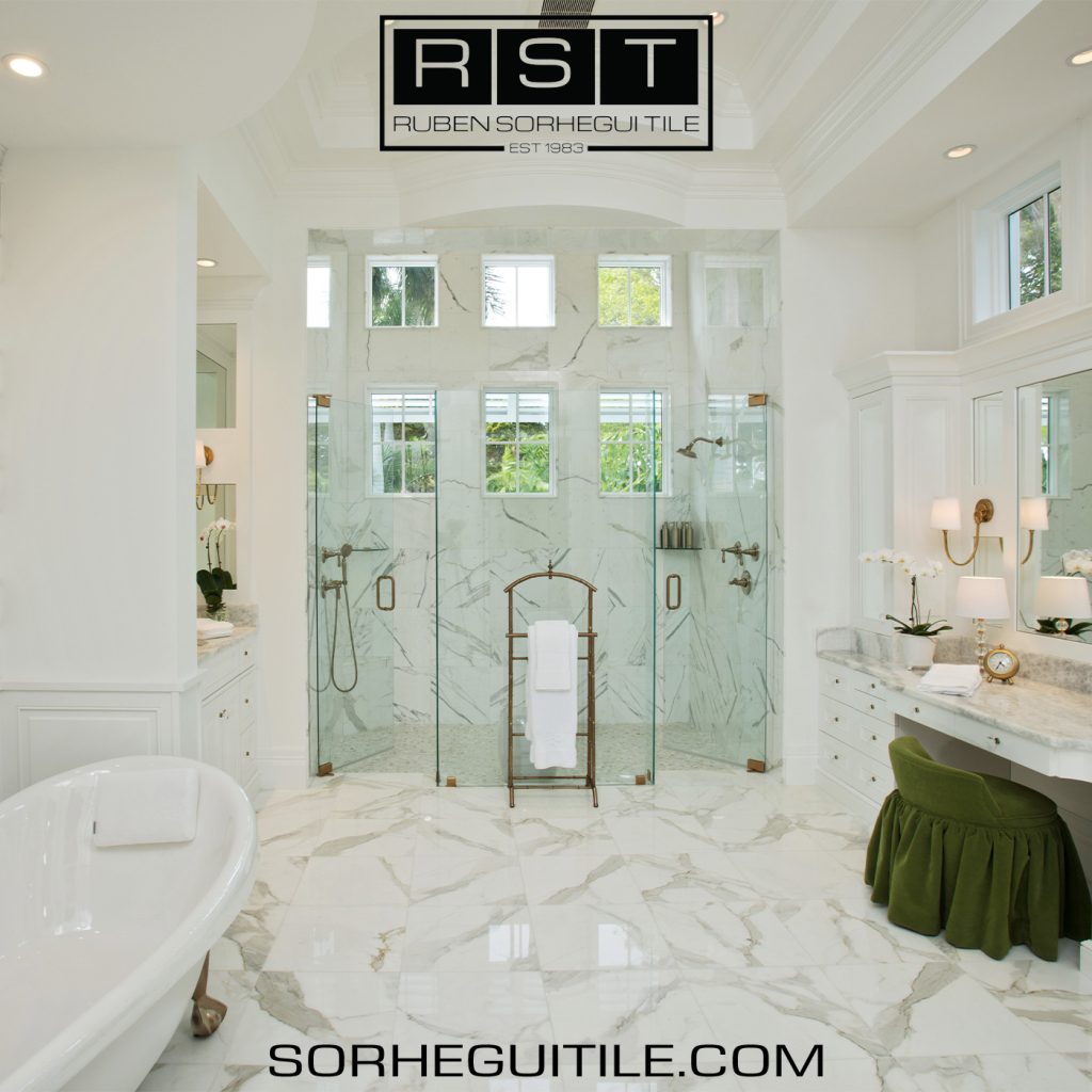 A spacious bathroom with natural stone tiles.