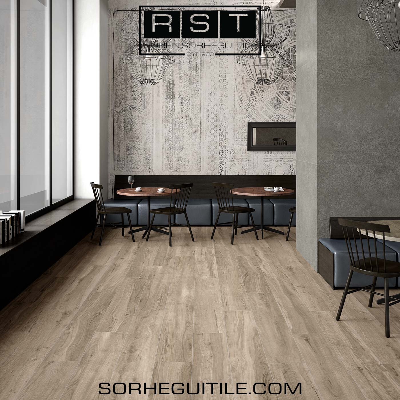 A café interior with light wood look flooring.