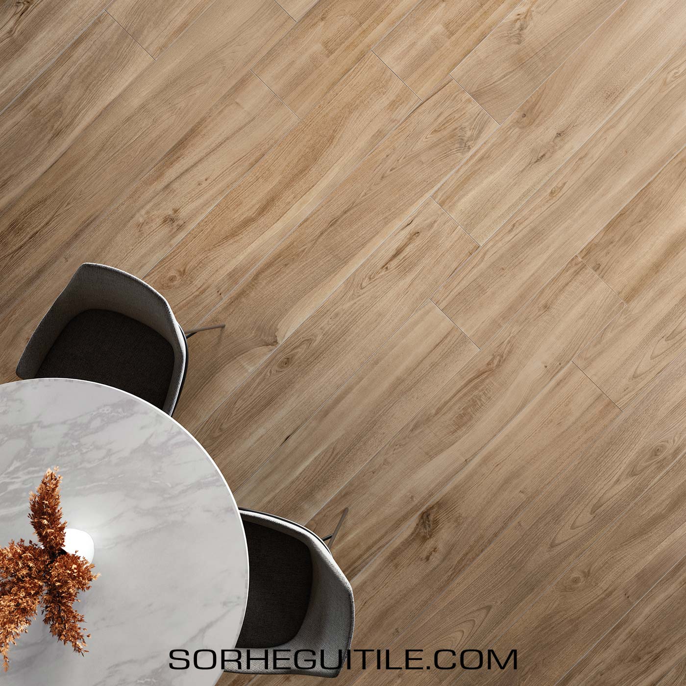 A small dining room table atop wood look flooring.